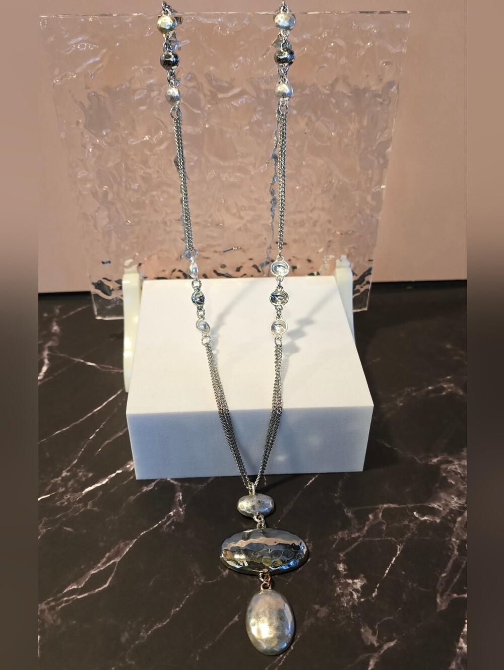 Silver Pendant Necklace with Multi-Tier Hammered Metal Discs